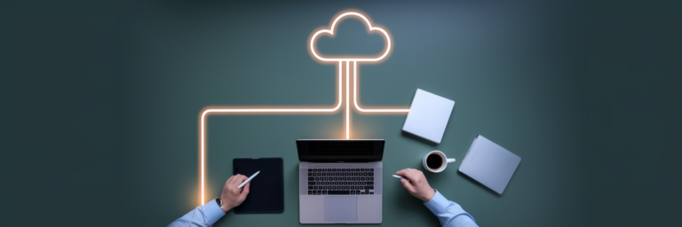 Freelancer desk with cloud backup visualisation.